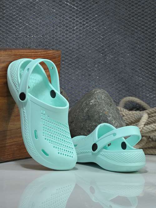 Women Green Solid Clogs
